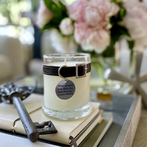 custom candle with faux leather collar and personalized stainless steel tag. all natural soy wax in a recyclable glass jar.