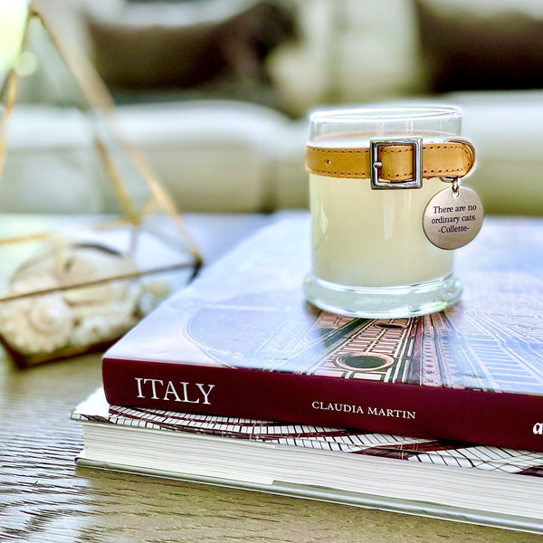 custom candle with faux leather collar and personalized stainless steel tag. all natural soy wax in a recyclable glass jar.